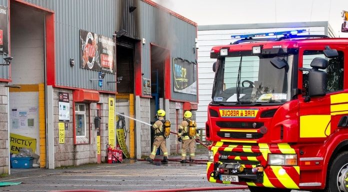 Emergency Services Dealing With Commercial Fire In Ennis